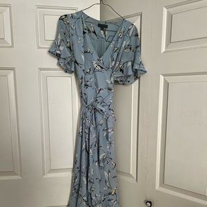 Blue wrap midi dress. Yellow bird pattern with flowy ruffled sleeve.